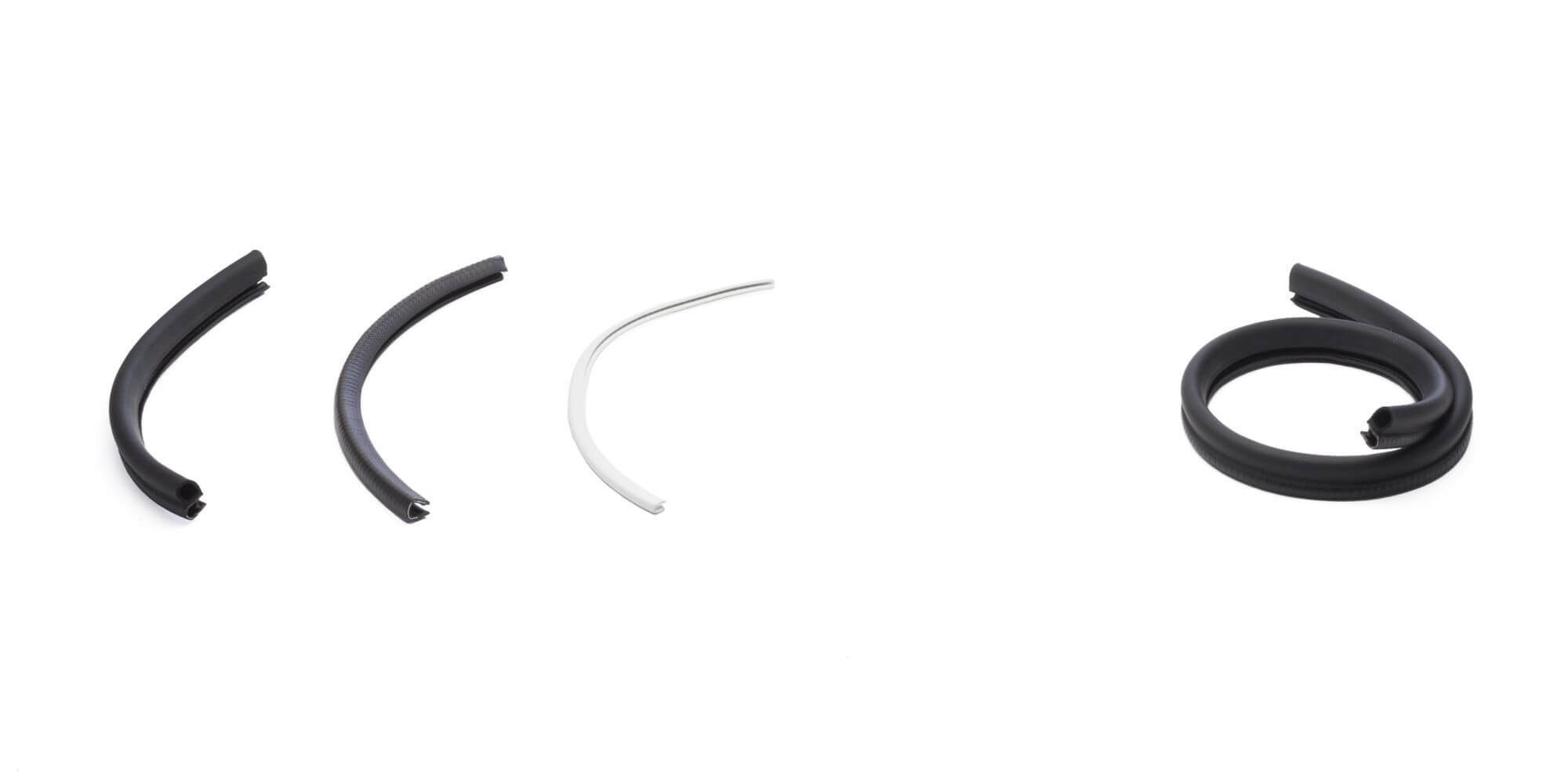Rubber edge trim and clamping profiles Rubber edge trim and clamping profiles