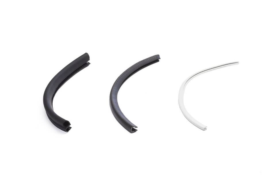 Rubber edge trim and clamping profiles Rubber edge trim and clamping profiles